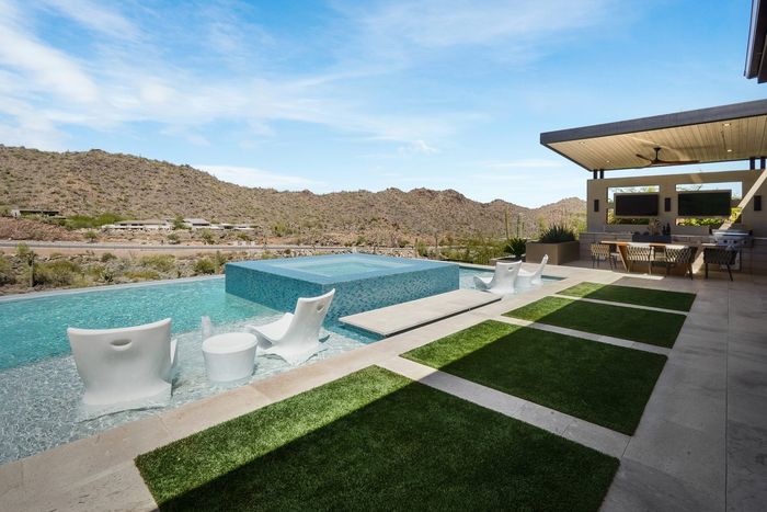 The raised spa and infinity edge