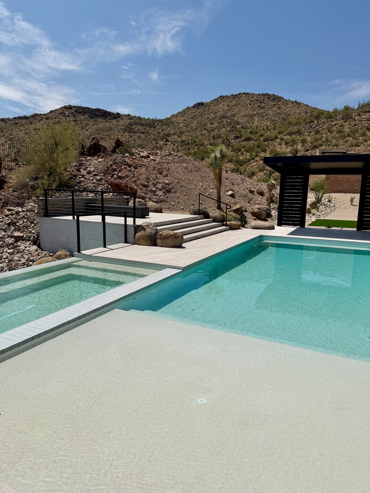 Pool, spa and Baja shelf with a louvered shade structure